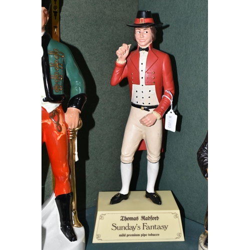 378 - A GROUP OF ADVERTISING FIGURES AND DECANTERS, comprising a 'Thomas Radford 'Sunday's Fantasy' mild p... 