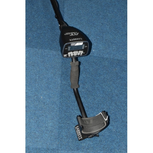 379 - A GARRETT AT-PRO INTERNATIONAL METAL DETECTOR, an all 'Terrain Pro' battery operated detector, witho... 