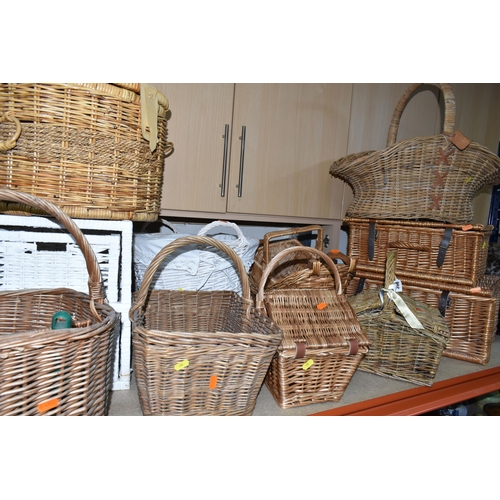 398 - FOURTEEN WICKER BASKETS, HAMPERS AND FLOOR STANDING VASES ETC, tallest floor vase approximately 64cm... 