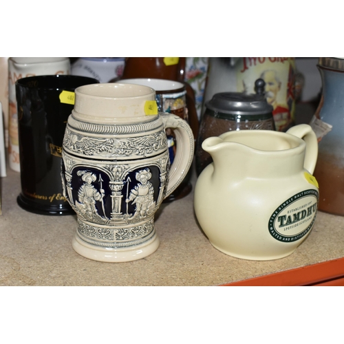 402 - A SELECTION OF DECORATIVE JUGS AND TANKARDS ETC, to include a Taylor Tunnicliffe jug with silver rim... 