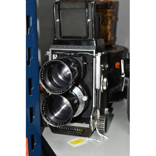 414 - VINTAGE MAMIYA ROLL FILM CAMERAS AND LENSES, comprising a Mamiya C220 Professional camera fitted wit... 