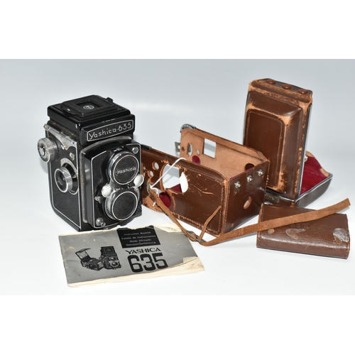 416 - A YASHICA 635 TWIN LENS CAMERA AND CASE, the camera has the 35mm film adaptor kit fitted, together w... 