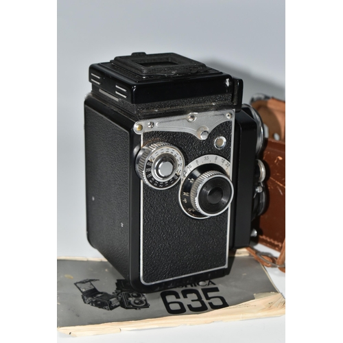 416 - A YASHICA 635 TWIN LENS CAMERA AND CASE, the camera has the 35mm film adaptor kit fitted, together w... 