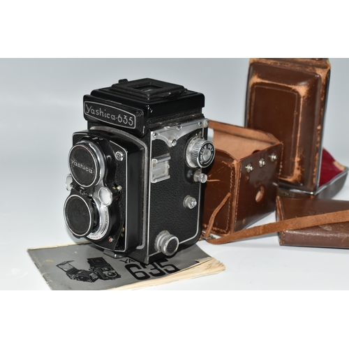 416 - A YASHICA 635 TWIN LENS CAMERA AND CASE, the camera has the 35mm film adaptor kit fitted, together w... 