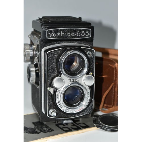 416 - A YASHICA 635 TWIN LENS CAMERA AND CASE, the camera has the 35mm film adaptor kit fitted, together w... 