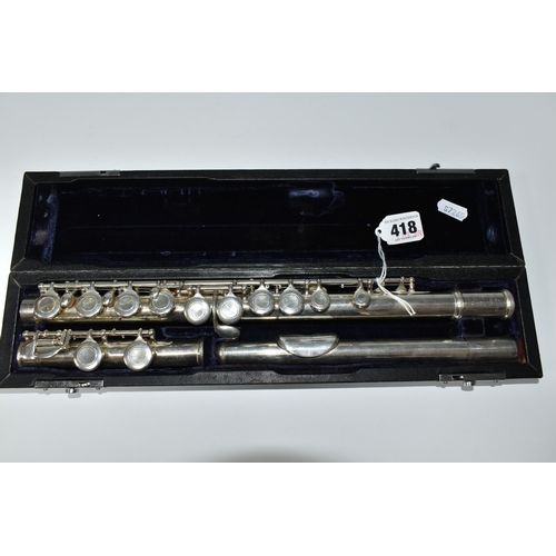 418 - A CASED FLUTE, by Trevor J. James, stamped T.J. 10 with serial no 11709, in a hard fitted case (1) (... 