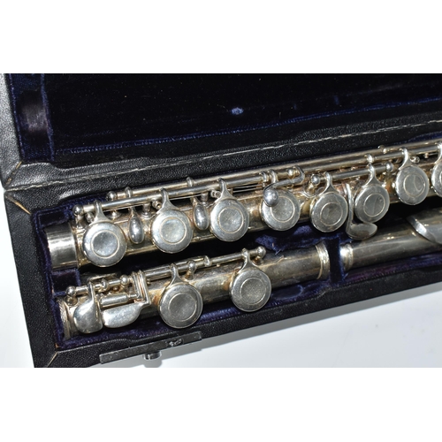 418 - A CASED FLUTE, by Trevor J. James, stamped T.J. 10 with serial no 11709, in a hard fitted case (1) (... 