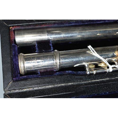 418 - A CASED FLUTE, by Trevor J. James, stamped T.J. 10 with serial no 11709, in a hard fitted case (1) (... 