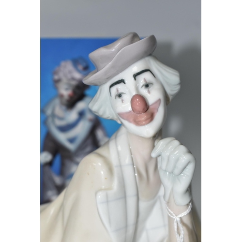 453 - A LLADRO CLOWN, no 4618, designed by Salvador Furio in 1970, the figure lying on his front with head... 