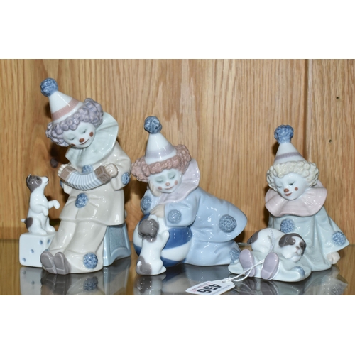 456 - THREE LLADRO PIERROT FIGURES, comprising Pierrot with Puppy no 5277, sculptor Jose Puche, issued 198... 