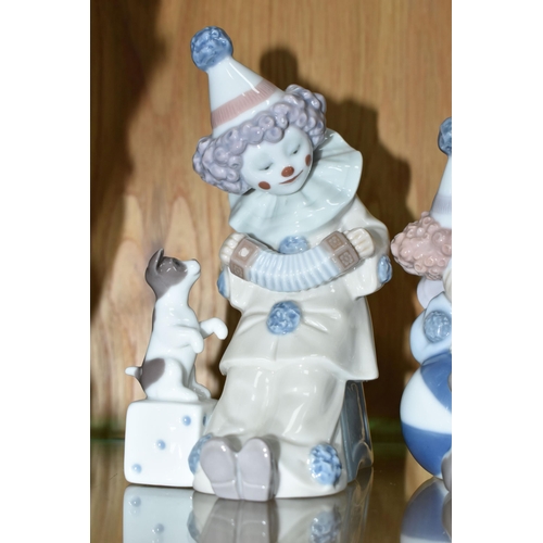 456 - THREE LLADRO PIERROT FIGURES, comprising Pierrot with Puppy no 5277, sculptor Jose Puche, issued 198... 