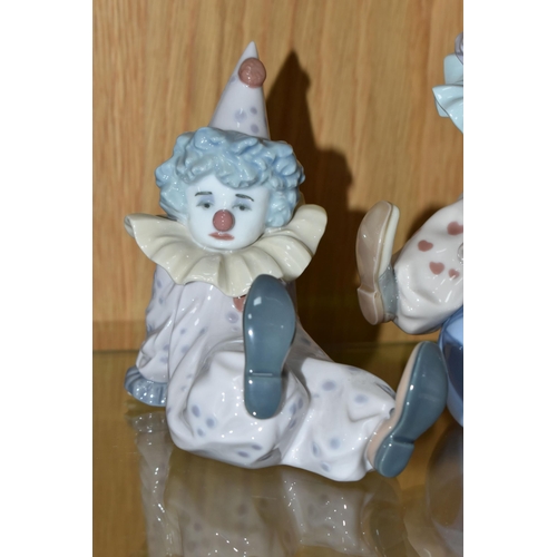 460 - THREE LLADRO CLOWN FIGURES, comprising Littlest Clown no 5811, Tired Friend no 5812 and Having a Bal... 