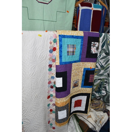 466 - TWO BOXES AND LOOSE APPLIQUÉ AND QUILTED BED COVERS, comprising a hand sewn large green and cream ap... 