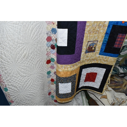 466 - TWO BOXES AND LOOSE APPLIQUÉ AND QUILTED BED COVERS, comprising a hand sewn large green and cream ap... 