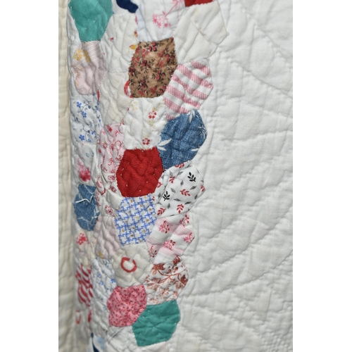 466 - TWO BOXES AND LOOSE APPLIQUÉ AND QUILTED BED COVERS, comprising a hand sewn large green and cream ap... 