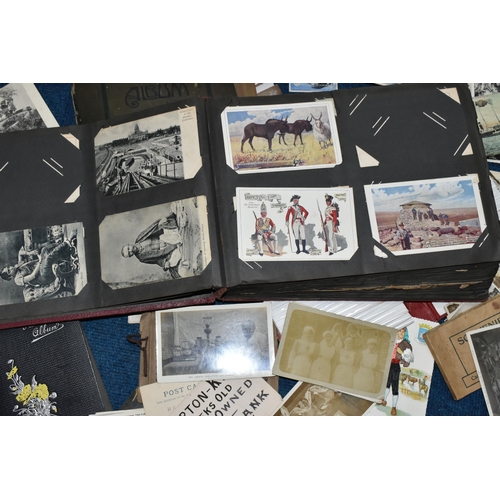 469 - ONE BOX OF POSTCARDS & PHOTOGRAPHS in albums and loose comprising rare examples from the early 20th ... 