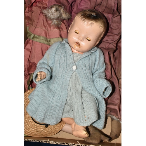 478 - A VINTAGE CLOTH HEAD DOLL, moulded and painted features, original wig, cloth body with composition l... 