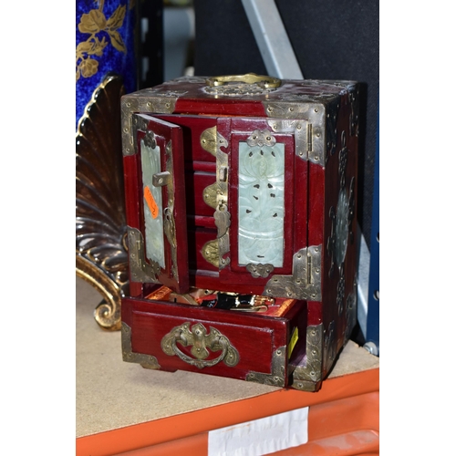 484 - AN EDWARDIAN SMOKER'S CABINET,  oak cased, glazed door and brass handled internal drawer, height 38c... 