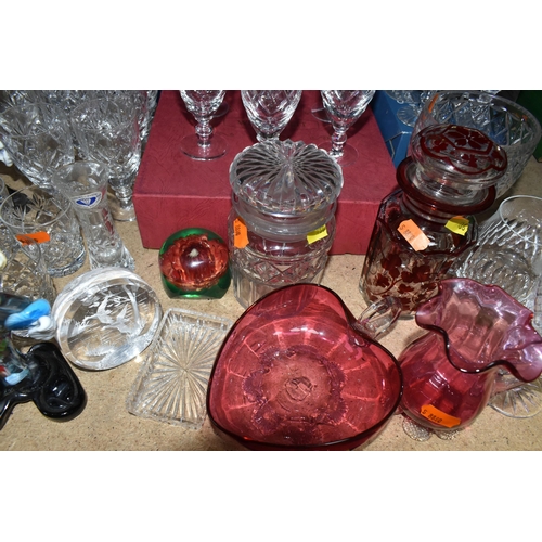 486 - A GROUP OF CUT CRYSTAL AND COLOURED GLASSWARE, comprising a boxed set of six Tutbury Crystal port gl... 