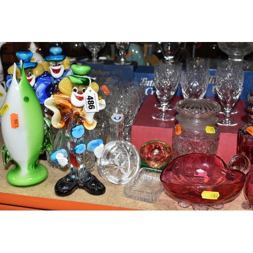 486 - A GROUP OF CUT CRYSTAL AND COLOURED GLASSWARE, comprising a boxed set of six Tutbury Crystal port gl... 