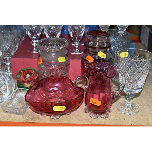 486 - A GROUP OF CUT CRYSTAL AND COLOURED GLASSWARE, comprising a boxed set of six Tutbury Crystal port gl... 