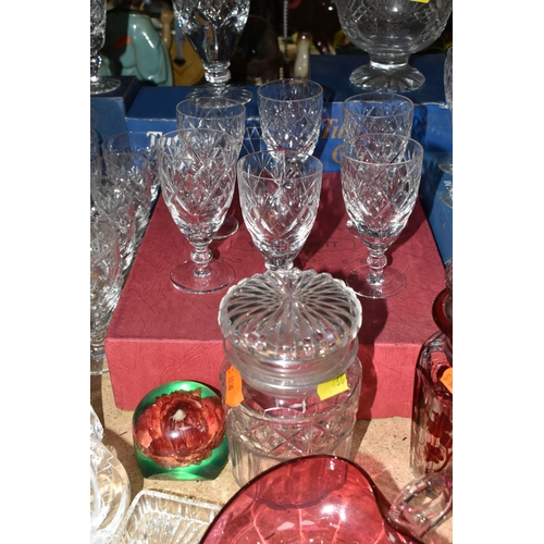 486 - A GROUP OF CUT CRYSTAL AND COLOURED GLASSWARE, comprising a boxed set of six Tutbury Crystal port gl... 