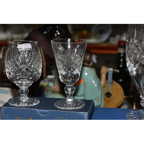 486 - A GROUP OF CUT CRYSTAL AND COLOURED GLASSWARE, comprising a boxed set of six Tutbury Crystal port gl... 