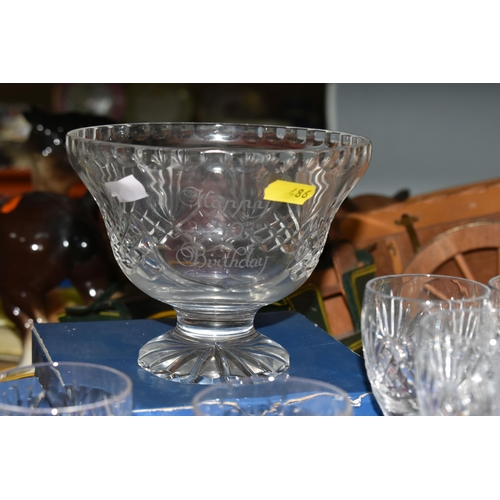 486 - A GROUP OF CUT CRYSTAL AND COLOURED GLASSWARE, comprising a boxed set of six Tutbury Crystal port gl... 