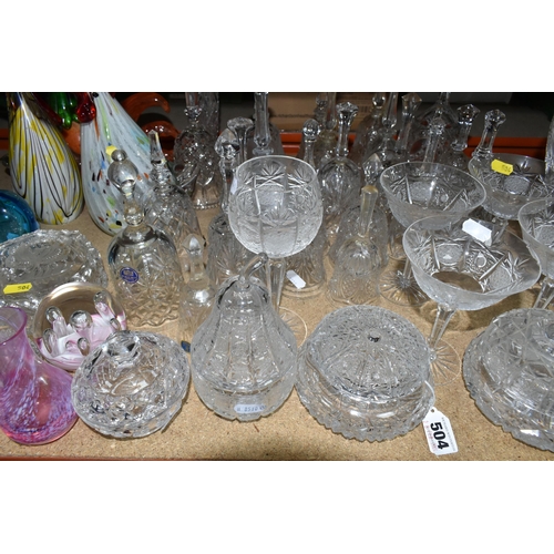 504 - A LARGE COLLECTION OF CUT GLASS BELLS AND GLASSWARE, comprising twenty three cut glass bells, maker'... 