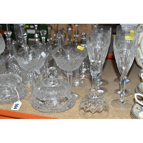 504 - A LARGE COLLECTION OF CUT GLASS BELLS AND GLASSWARE, comprising twenty three cut glass bells, maker'... 