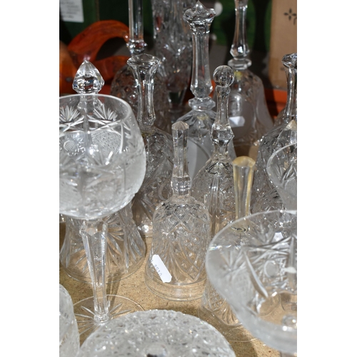 504 - A LARGE COLLECTION OF CUT GLASS BELLS AND GLASSWARE, comprising twenty three cut glass bells, maker'... 