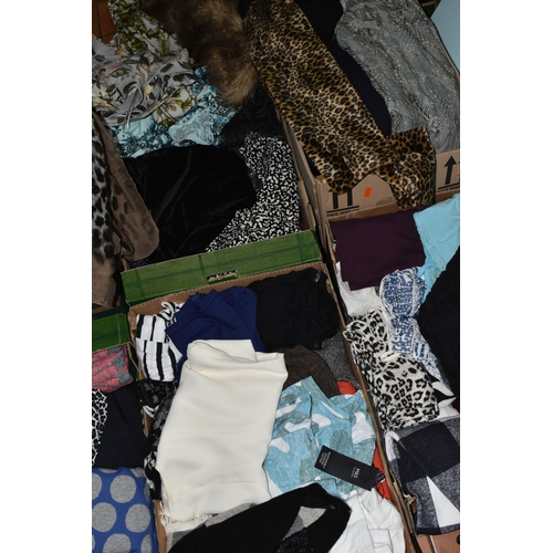 520 - NINE BOXES AND TWO SUITCASES OF LADIES' CLOTHING, to include two black hard shell Delsey suitcases, ... 