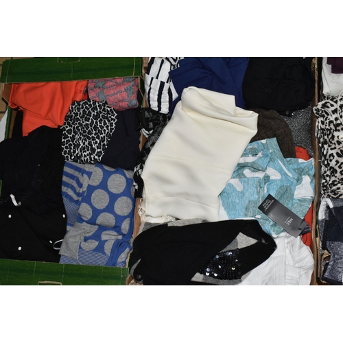 520 - NINE BOXES AND TWO SUITCASES OF LADIES' CLOTHING, to include two black hard shell Delsey suitcases, ... 