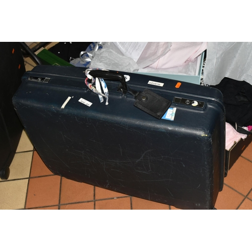 520 - NINE BOXES AND TWO SUITCASES OF LADIES' CLOTHING, to include two black hard shell Delsey suitcases, ... 