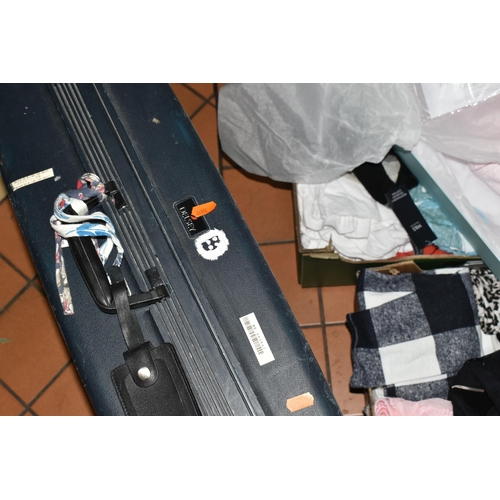 520 - NINE BOXES AND TWO SUITCASES OF LADIES' CLOTHING, to include two black hard shell Delsey suitcases, ... 