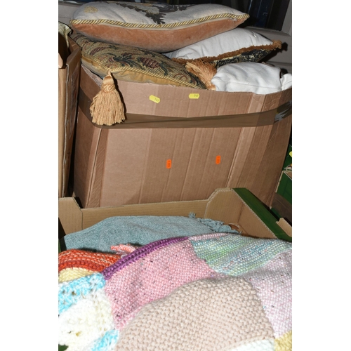 561 - FIVE BOXES OF CUSHIONS, KNITTING WOOL, A PAIR OF KNITTING NEEDLES, KNITTED BLANKET, ETC, the cushion... 