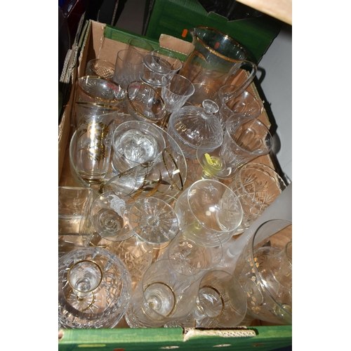 569 - FOUR BOXES AND LOOSE COLOURED AND CLEAR GLASSWARE, including vases, drinking glasses, bowls, dishes,... 