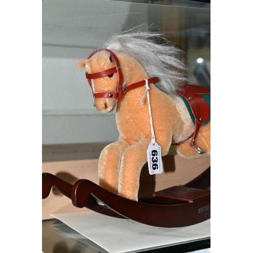 636 - A BOXED STEIFF LIMITED EDITION ROCKING HORSE, with beige mohair covering, red leather saddle and a w... 