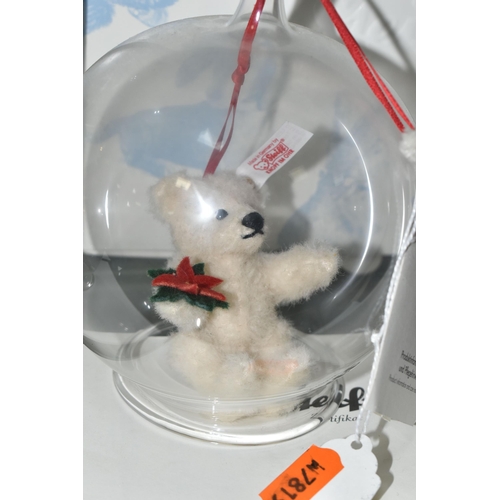 637 - THREE BOXED LIMITED EDITION STEIFF CHRISTMAS ORNAMENTS, each in a glass sphere, to include Teddy Bea... 