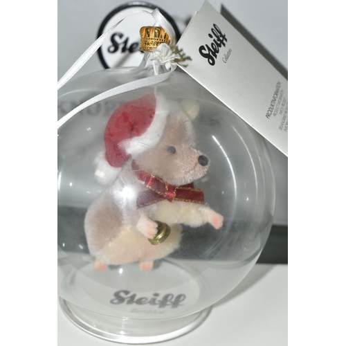 637 - THREE BOXED LIMITED EDITION STEIFF CHRISTMAS ORNAMENTS, each in a glass sphere, to include Teddy Bea... 