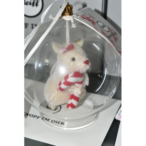 637 - THREE BOXED LIMITED EDITION STEIFF CHRISTMAS ORNAMENTS, each in a glass sphere, to include Teddy Bea... 