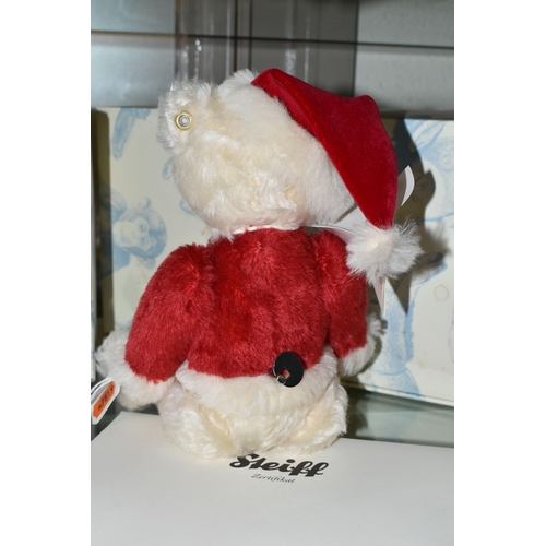 640 - A BOXED LIMITED EDITION STEIFF CHRISTMAS MUSICAL TEDDY BEAR, with red and white mohair and cotton, g... 