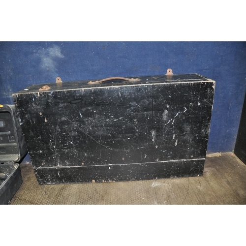 1062 - A WOODEN CARPENTERS TOOL BOX containing a 22in wooden plane (shows signs of woodworm), two saws, a M... 