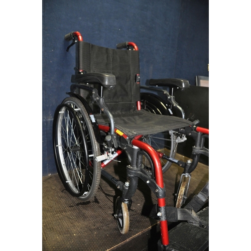 1064 - A KARMA MOBILITY WHEELCHAIR with two footrests