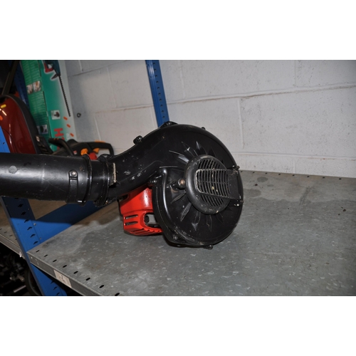 1066 - A HOMELITE HLB26BV PETROL LEAF BLOWER (engine starts and runs)