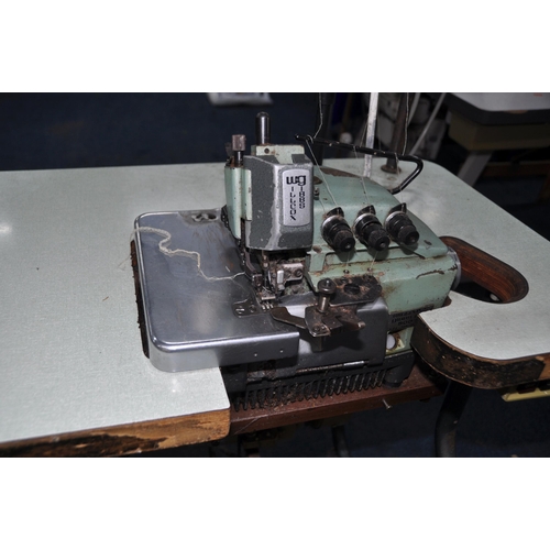 1094 - A WILCOX AND GIBBS 500/IV TYPE 504/IV OVERLOCKING SEWING MACHINE mounted into a worktable table widt... 