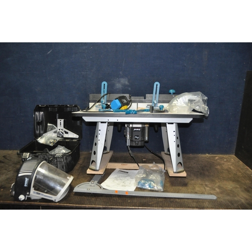 1120 - A MAKITA ROUTER TABLE 490 with accessories and manual with a Trend T11E 1/2in router fitted and case... 