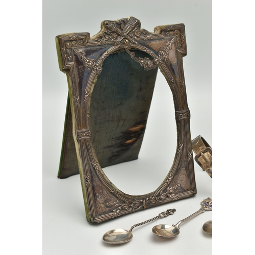 107 - TWO SILVER PHOTO FRAMES, A SILVER BANGLE AND TEASPOONS, two early 20th century silver photo frames, ... 