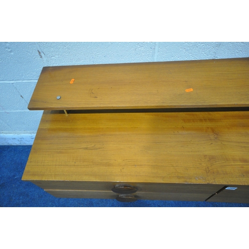 1208 - A MID CENTURY TEAK SIDEBOARD, with a raised shelf, fitted with four drawers, on cylindrical tapered ... 