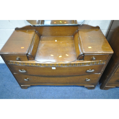 1213 - A LEBUS 20TH CENTURY OAK DRESSING CHEST, with a single mirror, two swinging drawers and two long dra... 